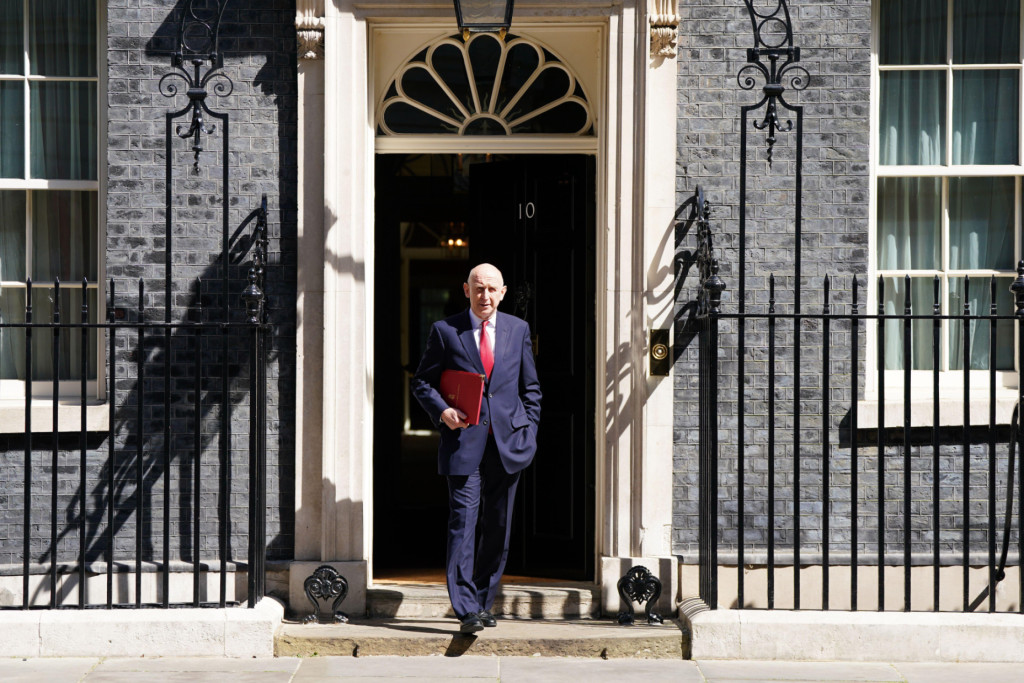 Image of the chancellor John Healy in front of Downing Street.