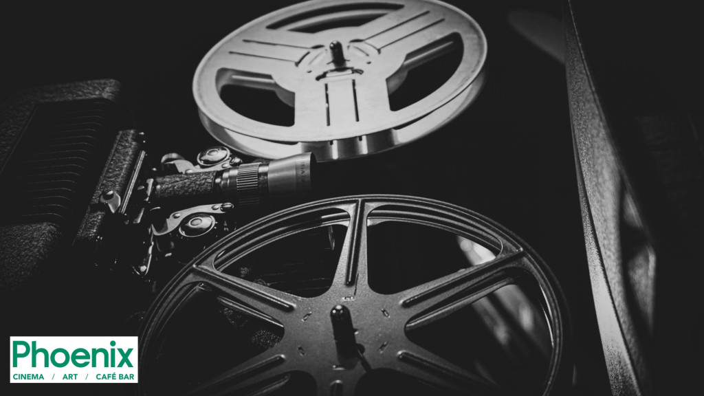 Black and white image of film casettes