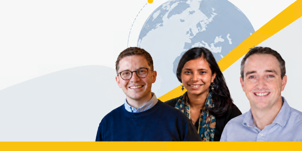 Three smiling people standing in front of a globe graphic with yellow diagonal accents.